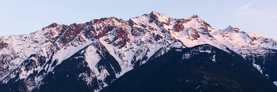 The Sun Sets On Iconic Mount Currie Still Covered In Snow On A Spring ...