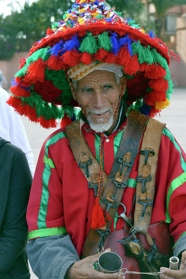 Traditional water seller in red uniform by Steve Estvanik Traditional water seller in red uniform by Steve Estvanik
