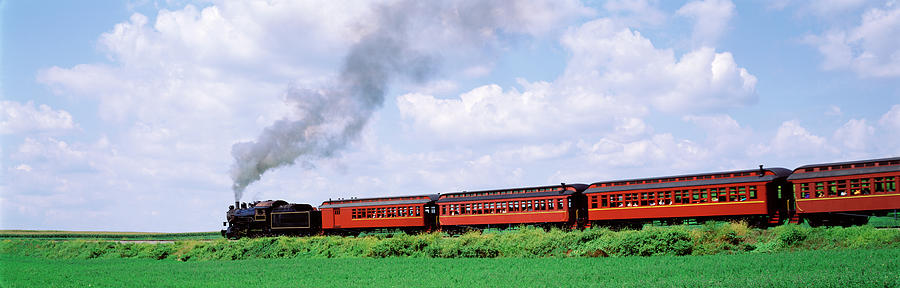 train-moving-on-a-railroad-track-photograph-by-panoramic-images-fine