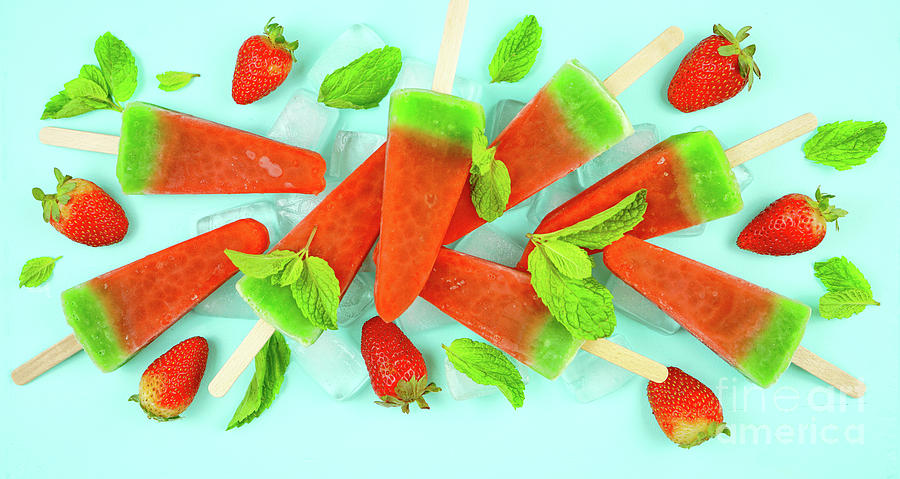 Watermelon flavored summer ice cream popsicles on pink and blue background. #3 Photograph by Milleflore Images