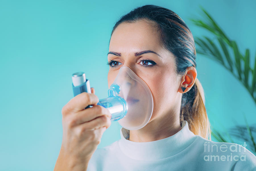 Woman Using Inhaler For Asthma Photograph by Microgen Images/science ...