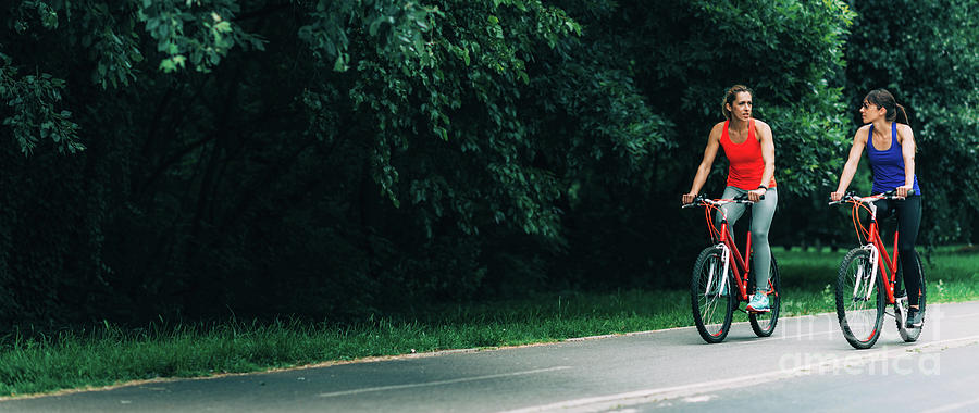 women riding bikes