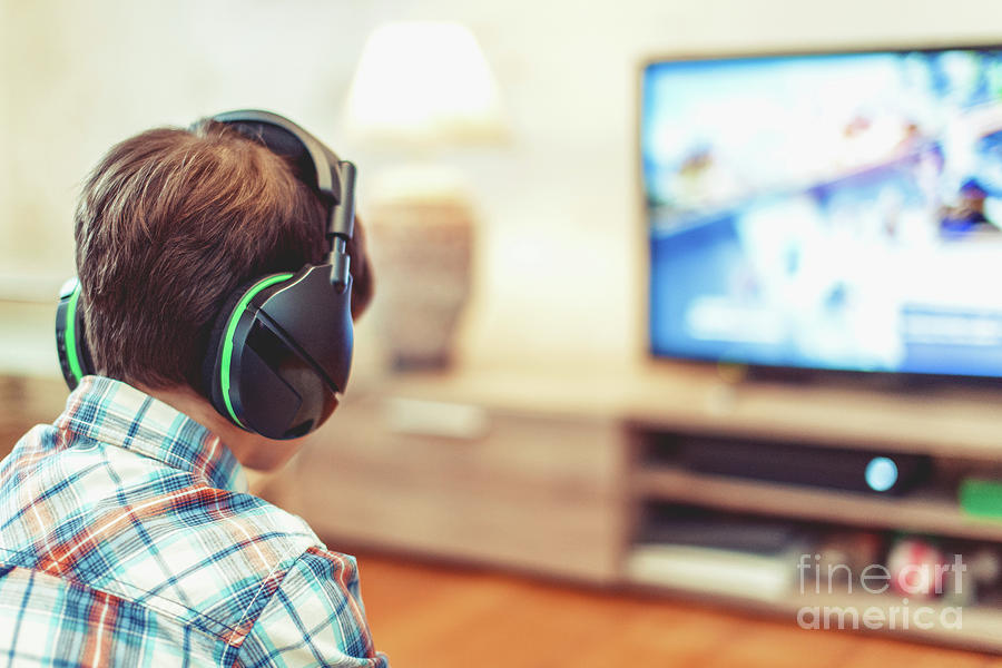 Young Boy Playing Video Game #3 Photograph by Sakkmesterke/science Photo Library