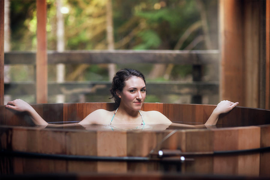 Nature Photograph - Young Smiling Woman At Sauna #3 by Cavan Images