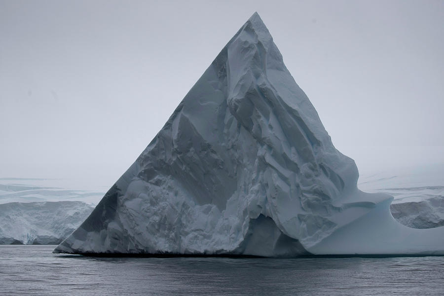 An Iceberg Floats Near Two Hummock Photograph by Ueslei Marcelino ...