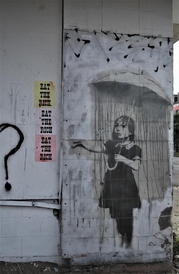 Banksy Umbrella Girl In New Orleans Graffiti Speaks Louder Than Words Photograph by Michael Hoard