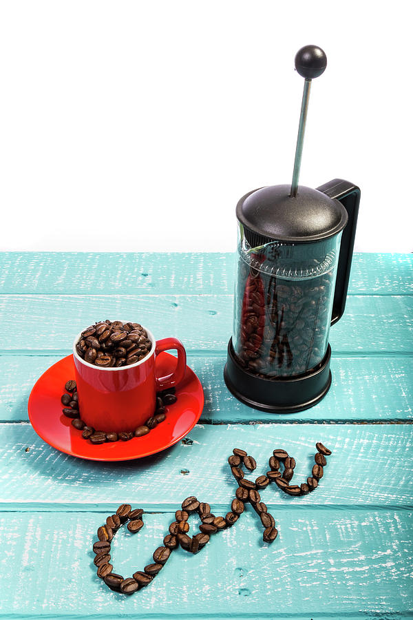 Coffee on a blue weathered table by Ben Gingell Coffee on a blue weathered table by Ben Gingell
