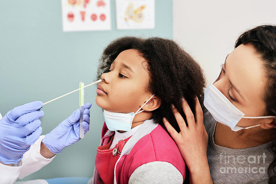 Doctor Taking Nasal Swab #4 by Peakstock / Science Photo Library