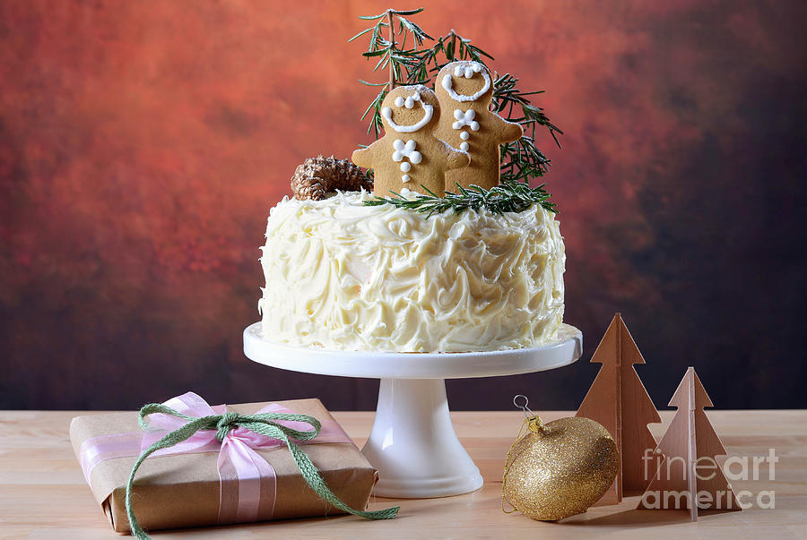 Festive Christmas white chocolate cake with gingerbread men cook #4 Photograph by Milleflore Images
