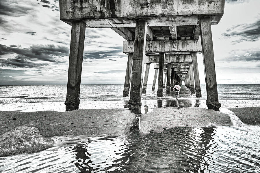 Juno Digital Art - Florida, South Florida, Woman Running Under The Juno Beach Pier #4 by Laura Diez