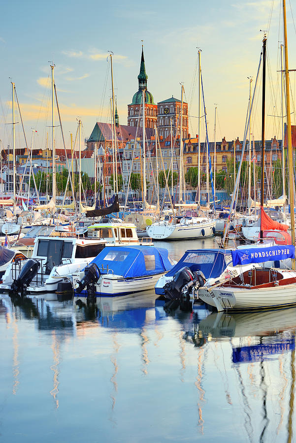Sunset Digital Art - Germany, Mecklenburg-western Pomerania, Stralsund, View Across Citymarina Stralsund And Hafen With St.nikolai-kirche In The Background And Yachts In The Foreground. #4 by Francesco Carovillano