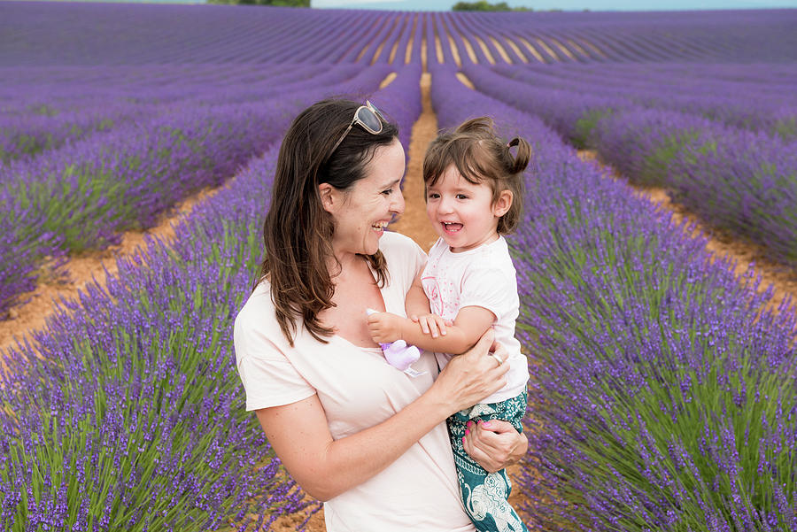 Summer Photograph - Happy Mother And Daughter Walking Among Lavender Fields In The Summer #4 by Cavan Images