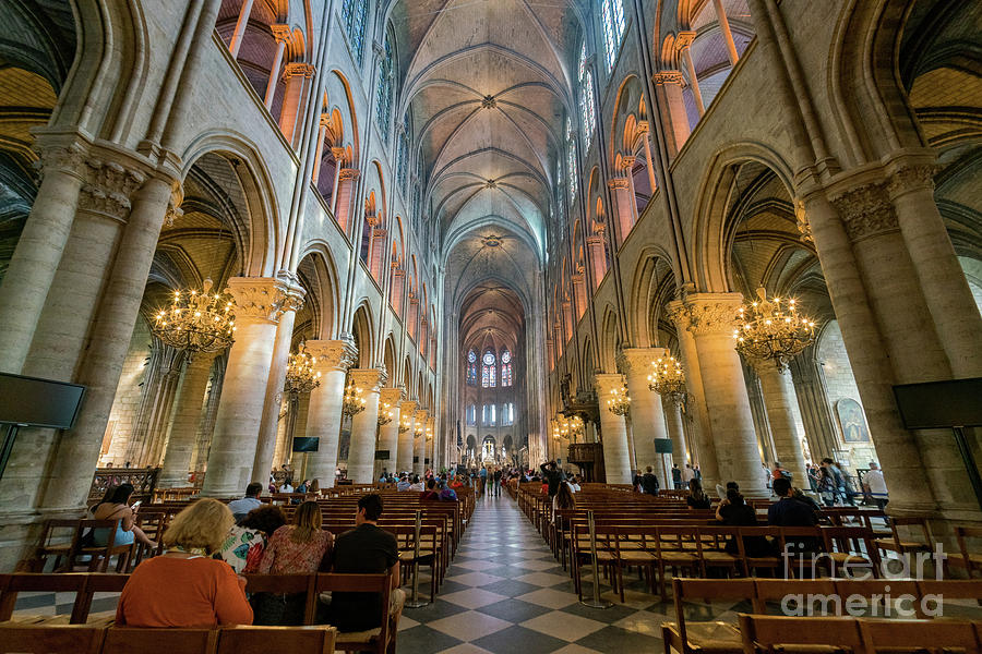 Interior view of the famous Notre-Dame de Paris Photograph by Chon Kit