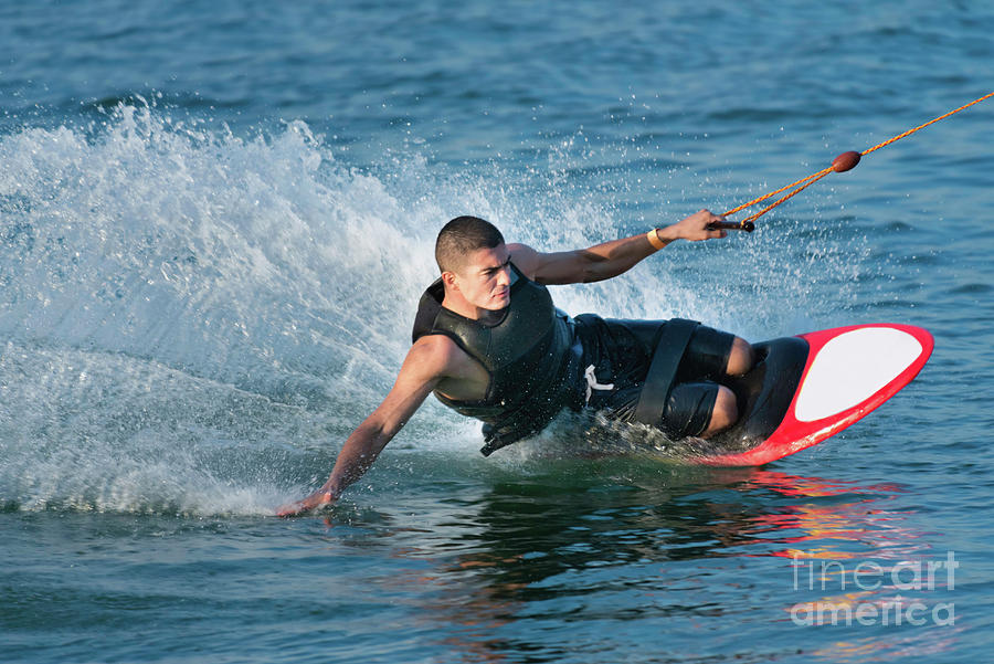 Man Kneeboarding #4 by Microgen Images/science Photo Library