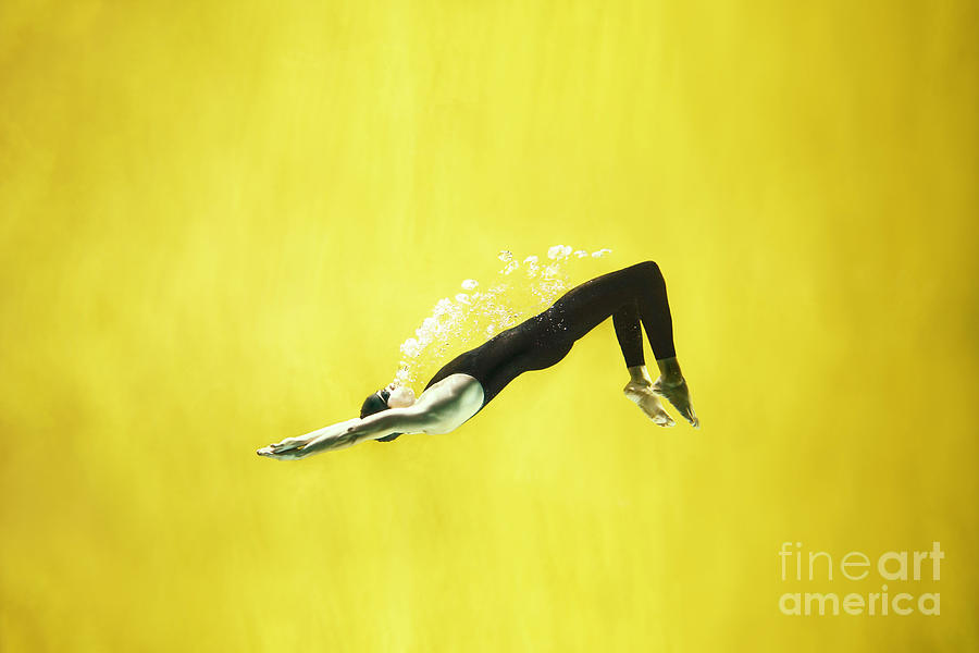 Man Swimming Underwater On Yellow #4 Photograph by Stanislaw Pytel