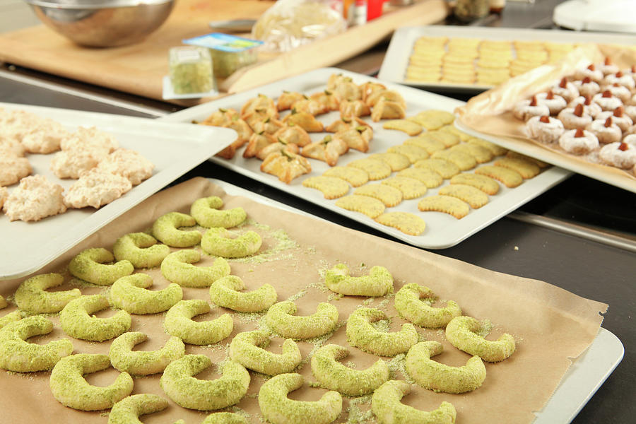 Moon Shaped Cookies On Baking Tray Photograph by Jalag-fotostudio ...