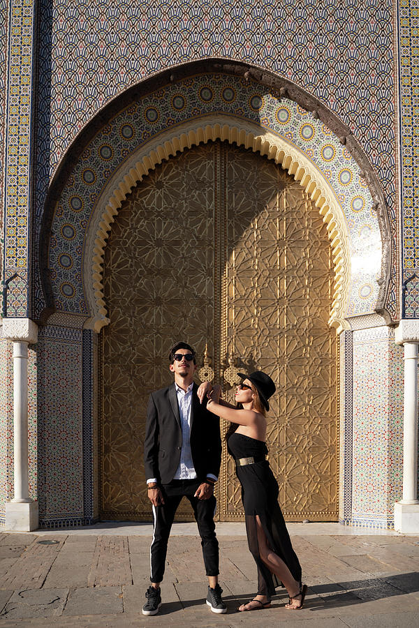 Moroccan Man With Sunglasses And Suit Together A Beautiful Woman ...