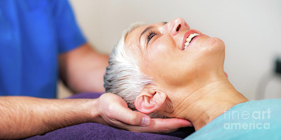 Physical Therapist Stretching Senior Womans Neck #4 Photograph by Microgen Images/science Photo Library