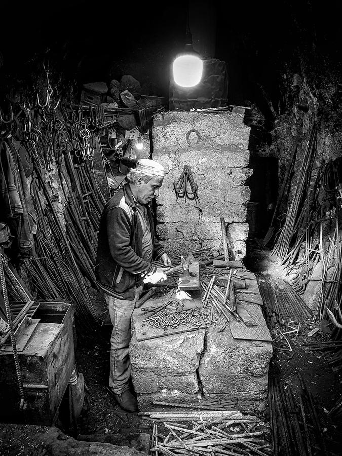 Man Photograph - The Traditional Blacksmithing Profession In The City Of Mosul #4 by Bashar Alsofey