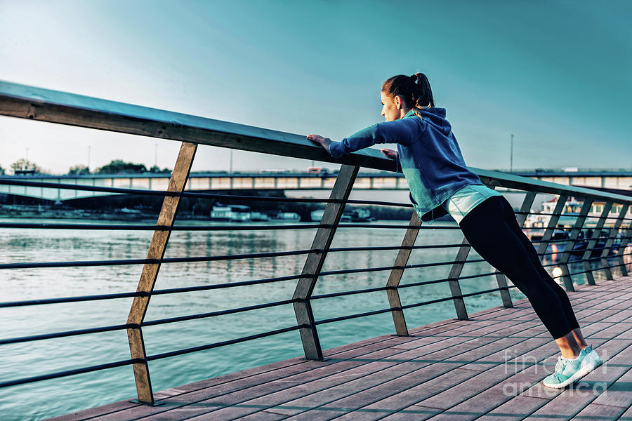 Woman Exercising Outside #4 Photograph by Microgen Images/science Photo Library