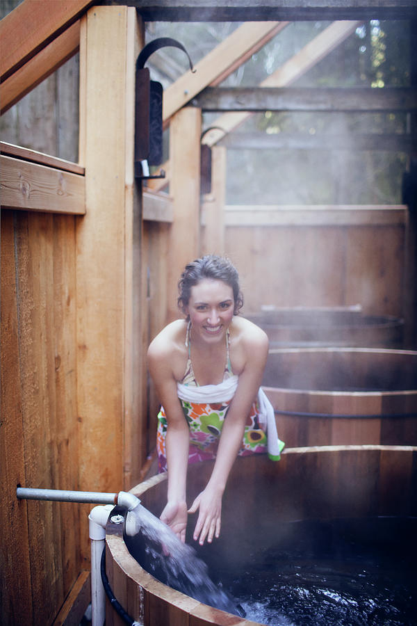 Nature Photograph - Young Smiling Woman At Sauna #4 by Cavan Images