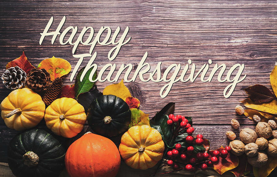 Happy Thanksgiving Day With Pumpkin And Nut On Wooden Table Photograph 