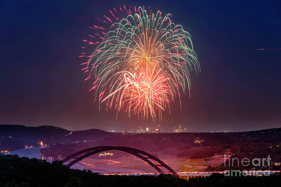 Independence Day Photograph - 4th of July fireworks paint the night sky over the 360 Pennyback by Dan Herron