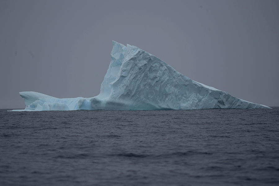 An Iceberg Floats Near Two Hummock Photograph by Ueslei Marcelino ...