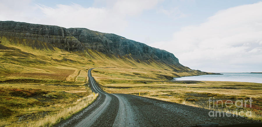 Asphalt mountain roads crossing dangerous Icelandic passes during a trip. #5 Photograph by Joaquin Corbalan