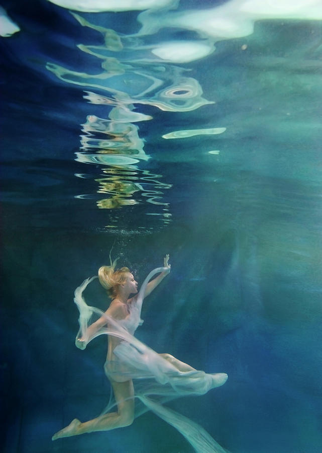 Caucasian Woman In Dress Swimming Under #5 Photograph by Ming H2 Wu