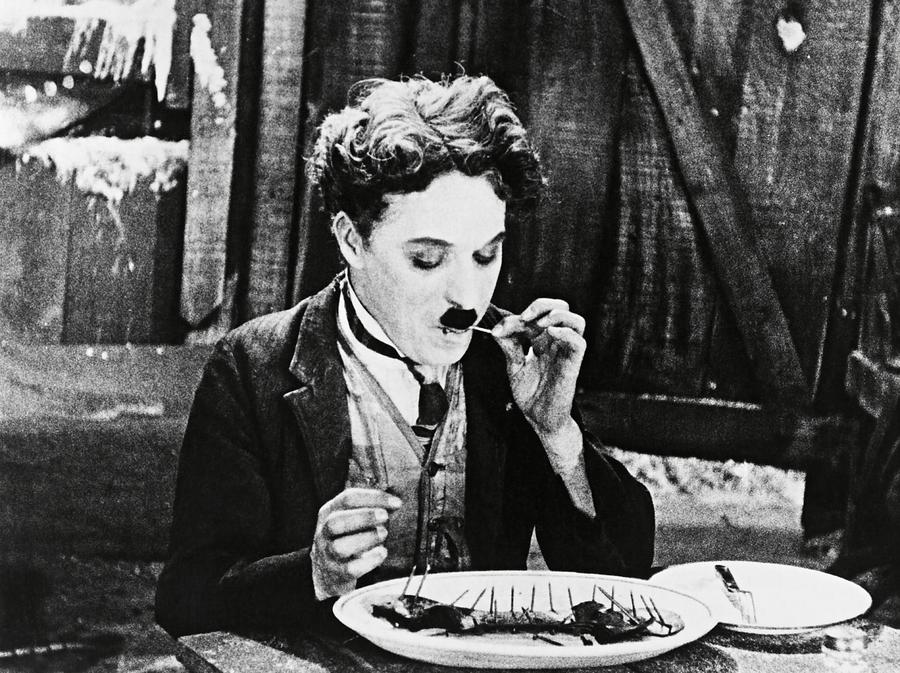 CHARLIE CHAPLIN in THE GOLD RUSH -1925-. #5 Photograph by Album
