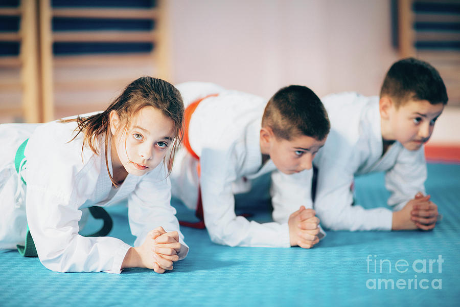 Children In Taekwondo Class #5 Photograph by Microgen Images/science Photo Library
