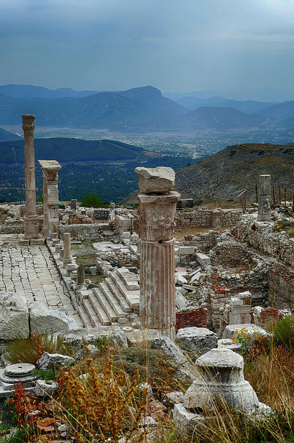 Column and arches of ancient Roman agora Photograph by Steve Estvanik