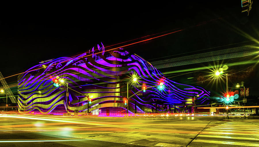 Exterior of Petersen Automotive Museum at night in november with #5 Photograph by Alex Grichenko