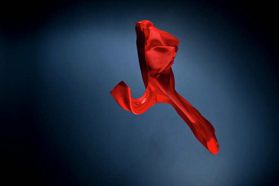 Floating Red Silk On A Dark Blue #5 Photograph by Gm Stock Films