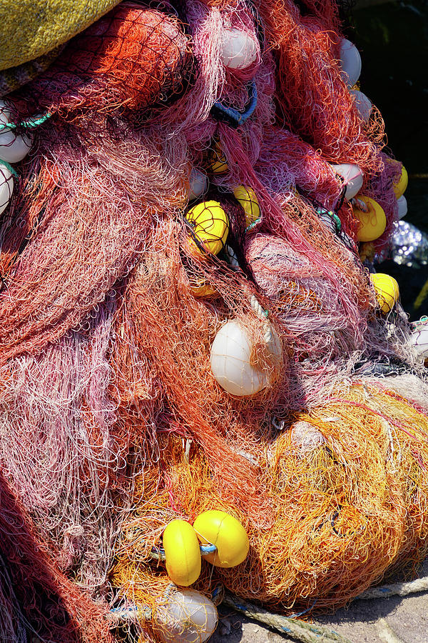 Multi-colored nylon fishing nets and floats #5 Photograph by Steve Estvanik