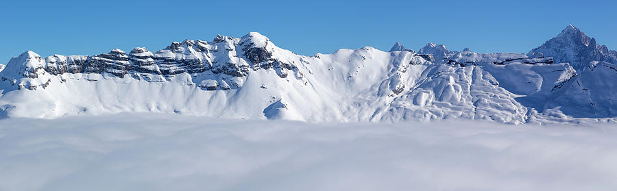 Panorama Of Mountains Rising From The Clouds Photograph