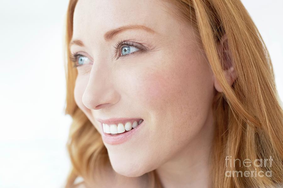 Woman blindfolded, smiling - Stock Image - F003/3209 - Science Photo Library