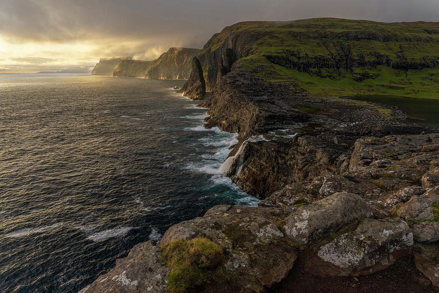 Steep Coast In The West Of The Island Of Vgar With The Waterfall Bsdalafossur And The Rock Needle Geitaskoradrangur Near The Largest Lake In The Faroe Islands, Leitisvatn, Faroe Islands #5 Photograph by Franz Subauer