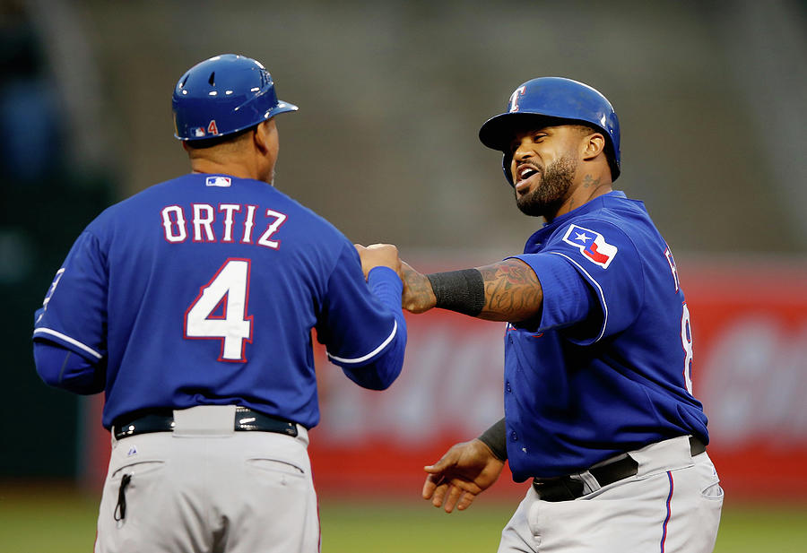 Texas Rangers V Oakland Athletics Photograph by Ezra Shaw Texas Rangers V Oakland Athletics Photograph by Ezra Shaw