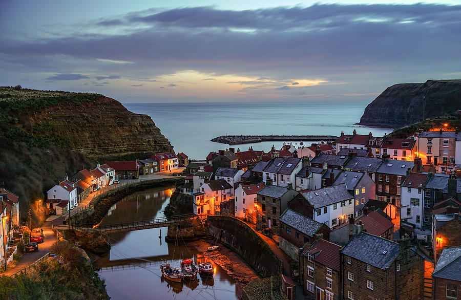 Christmas Photograph - The beautiful fishing village of Staithes in England. #5 by George Afostovremea