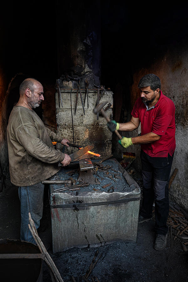 Men Photograph - The Traditional Blacksmithing Profession In The City Of Mosul #5 by Bashar Alsofey