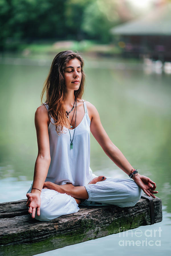 Woman Meditating By A Lake Photograph by Microgen Images/science Photo ...
