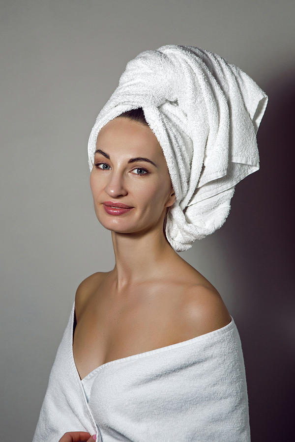 Young Girl In A White Robe And A Towel On Her Head Photograph
