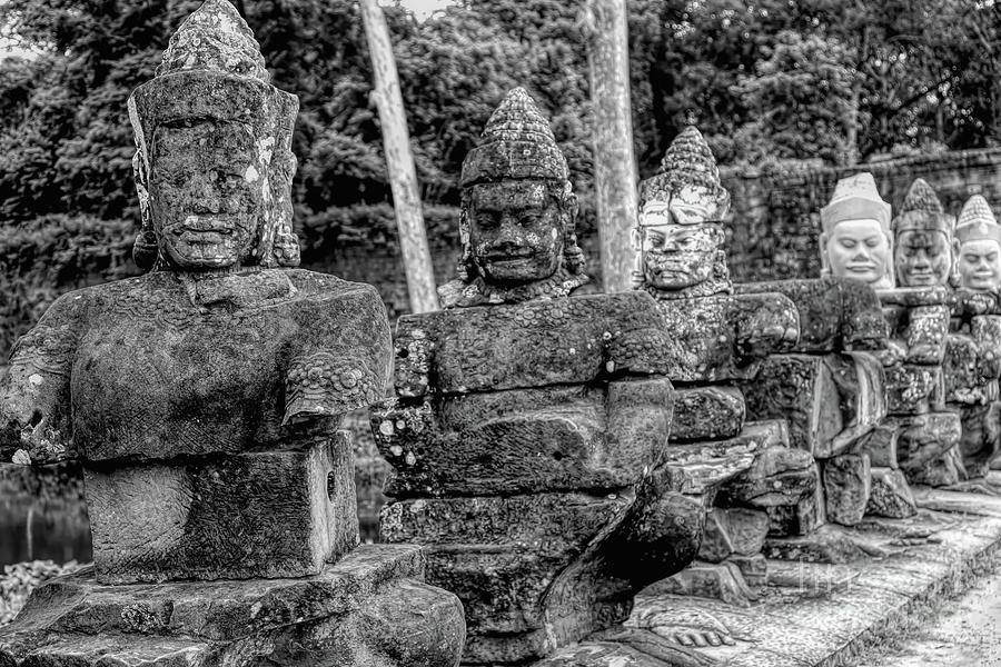 54 Guarding Gods of South Gate BW Cambodia  Photograph by Chuck Kuhn
