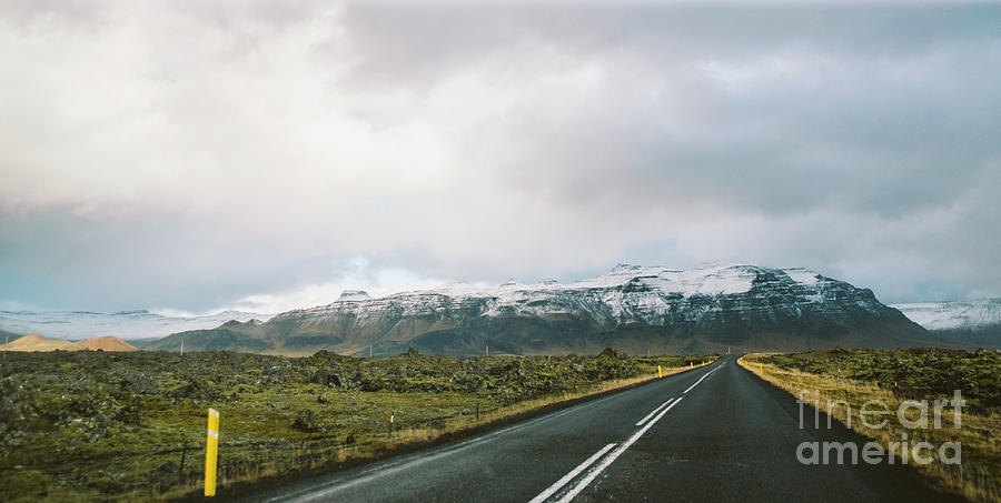 Asphalt mountain roads crossing dangerous Icelandic passes during a trip. #6 Photograph by Joaquin Corbalan