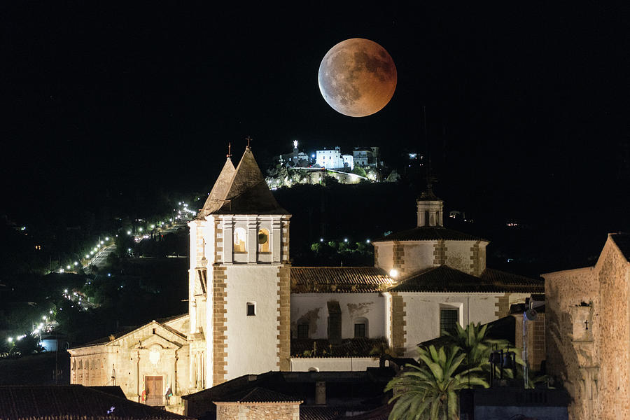 Double Exposures Of The Red Blood Moon Over The Caceres Old Town Photograph