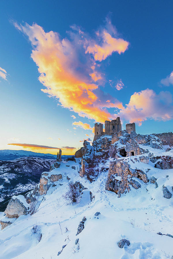 Italy, Abruzzo, Laquila District, Gran Sasso National Park, Calascio, Medieval Castle Or Rocca Calascio At Sunset On A Winter Evening With The Hill Full Of Snow #6 Digital Art by Maurizio Rellini