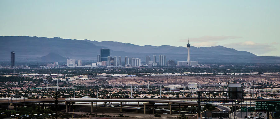 Las vegas city surrounded by red rock mountains and valley of fi #6 Photograph by Alex Grichenko