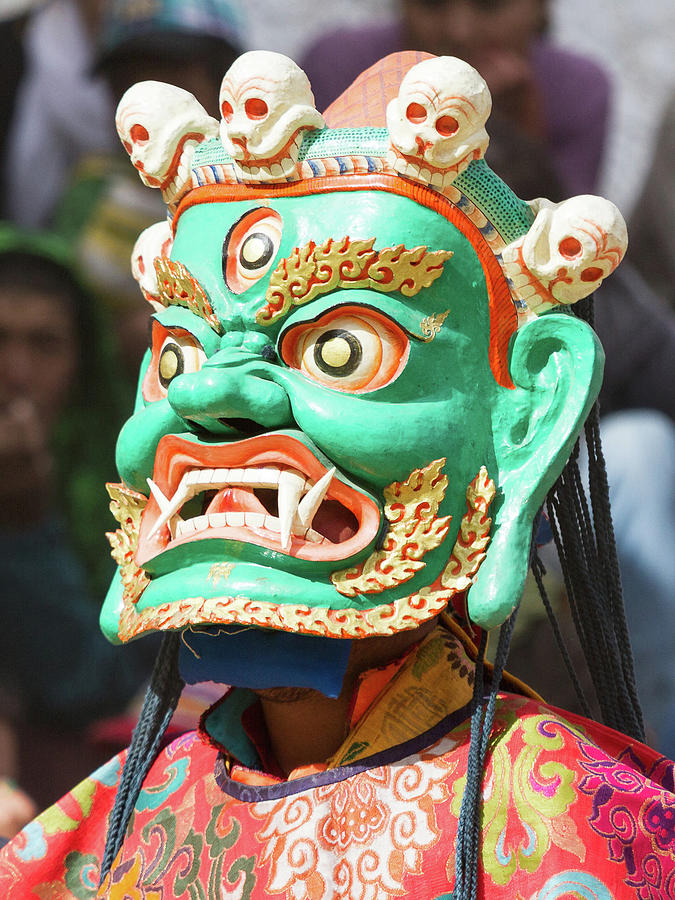 Skull Photograph - Monk in dharmapala mask performs a mystery dance of Tantric Tibetan Buddhism on Cham Dance Festival by Oleg Ivanov